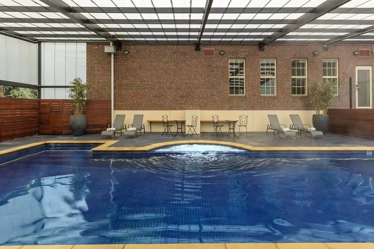Gym and outdoor lap pool currently under renovation